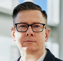 Alexander Hughes, CEO di una società di crypto trading, ritratto