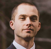 Thomas Whitfield, analista di trading ed esperto di mercato crypto, ritratto.